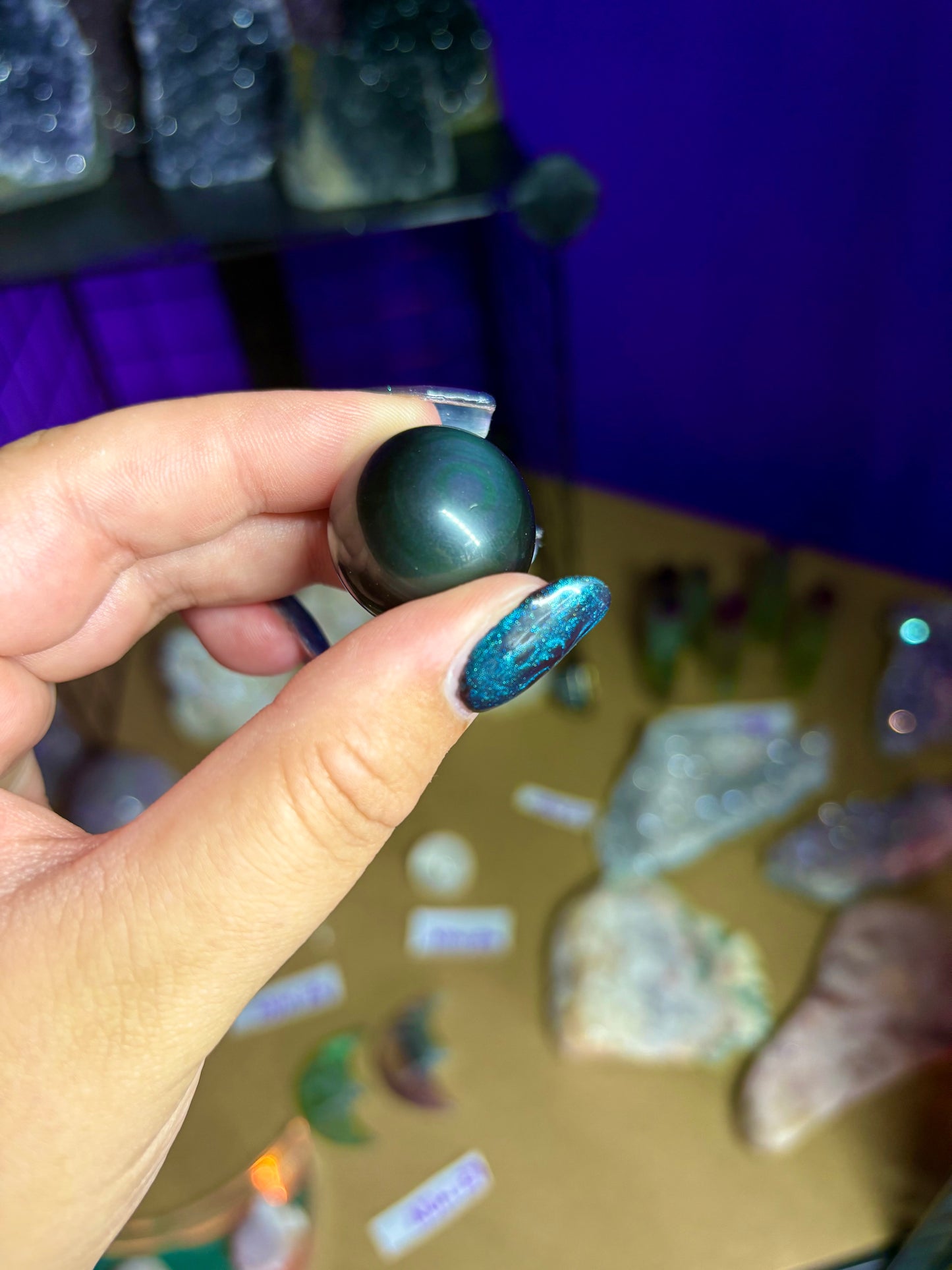 Small rainbow obsidian sphere