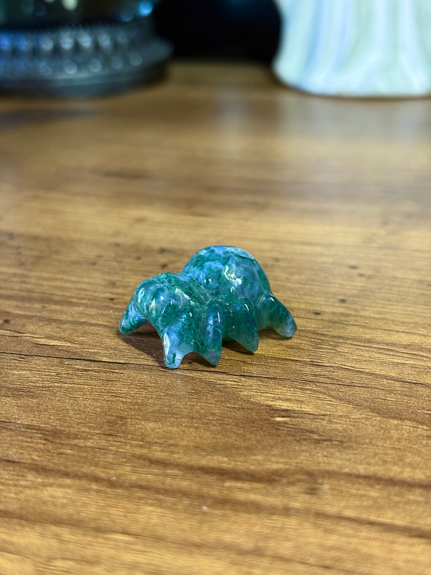 Moss agate spider carving