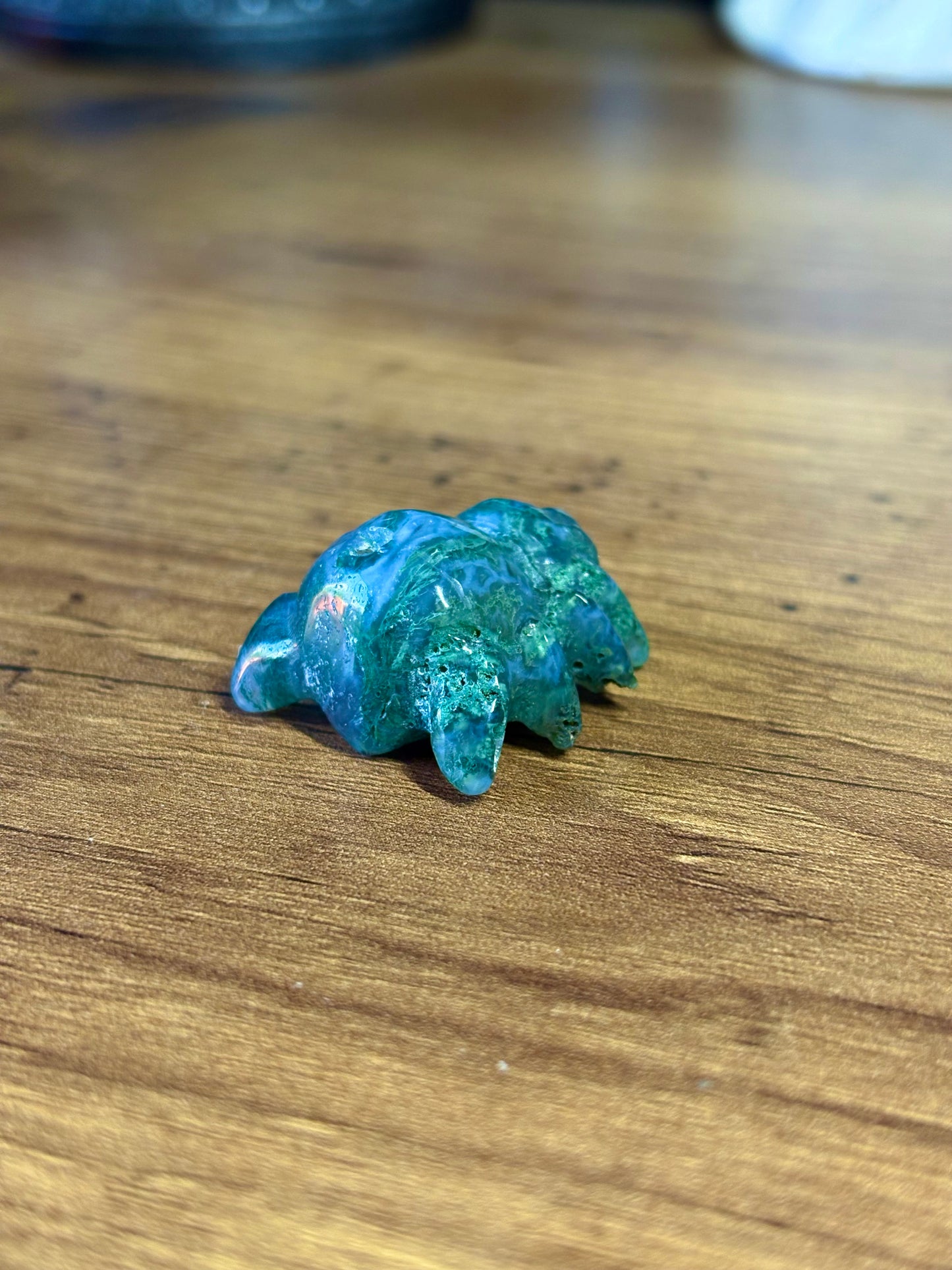 Moss agate spider carving