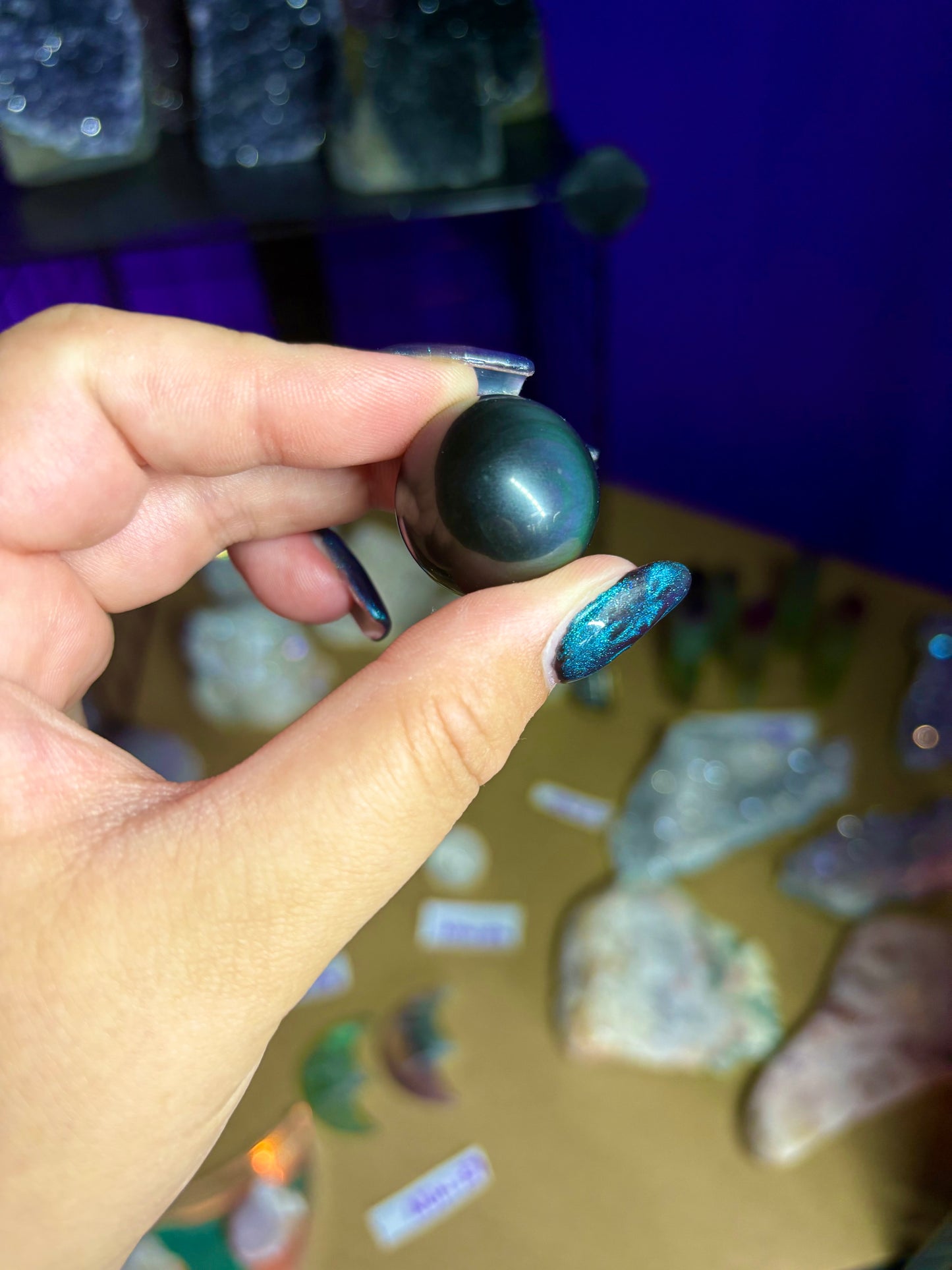 Small rainbow obsidian sphere