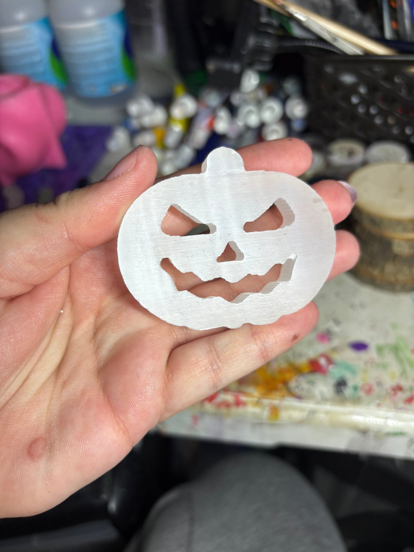 Selenite pumpkin carvings