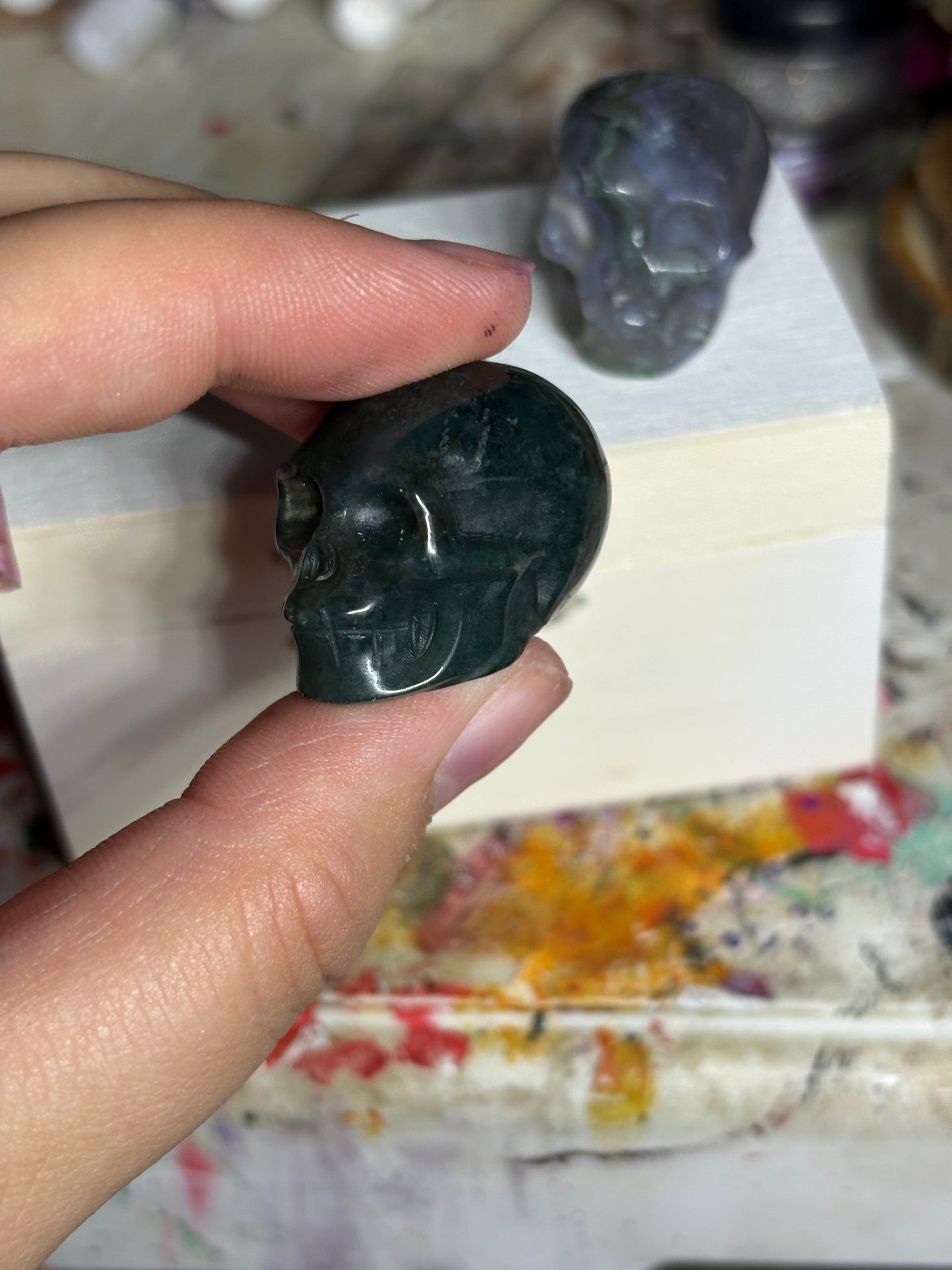 Moss agate skulls