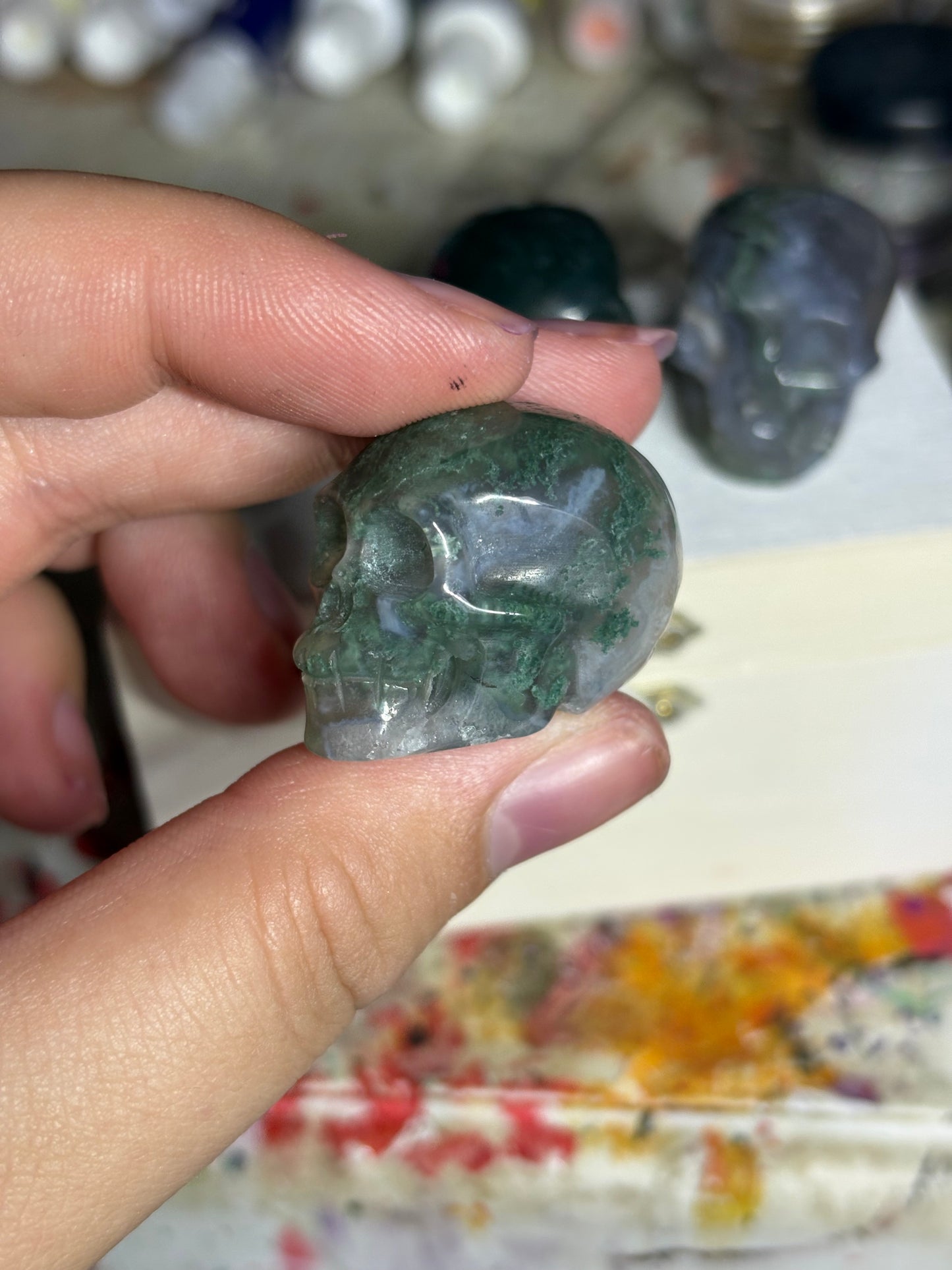 Moss agate skulls