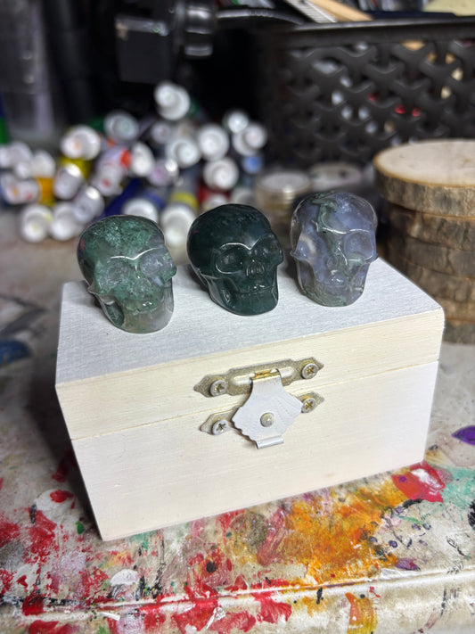 Moss agate skulls